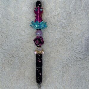 Beaded pen featuring a Dragon